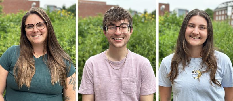 Three earth science students smiling at the camera